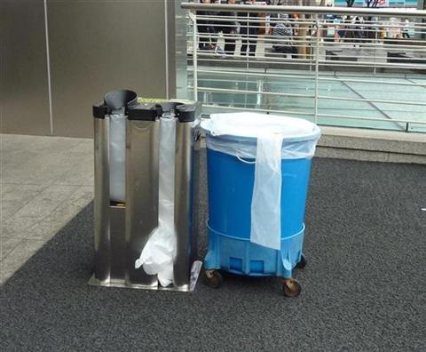 umbrella cover dispenser Outside the Seoul Post Office in Myeongdong