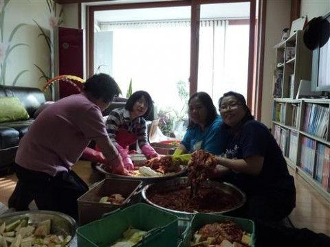 My MIL and SILs making kimchi for the winter season...