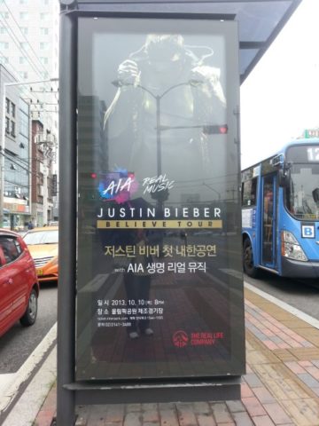 At a Seoul bus stop...